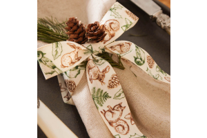 Christmas ribbon bow with forest creatures design.